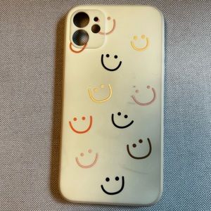 iPhone 11 case, tan with multi-color smiley faces
